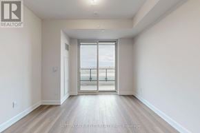 Oakville (Jm Joshua Meadows) condo for rent - A room with a sliding glass door leading to a balcony.