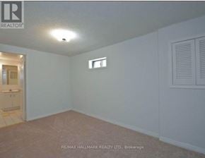 Pickering (Liverpool) apartment for rent - A room with a window and a door leading to another room.