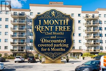 Waterloo multi-family for rent - A sign advertises a 1 month rent free offer for apartment complex.
