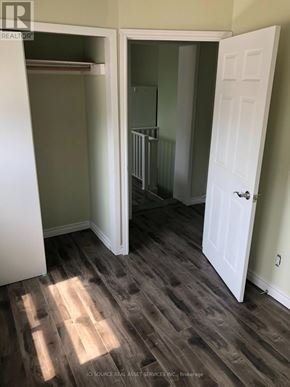 Toronto (Annex) apartment for rent - A room with a white door and a wooden floor.