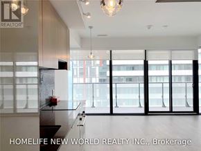 Toronto (Mount Pleasant West) condo for rent - A modern interior space with a glass wall and a chandelier.