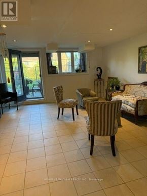Vaughan (Patterson) apartment for rent - A living room with a couch, chairs, and a piano.