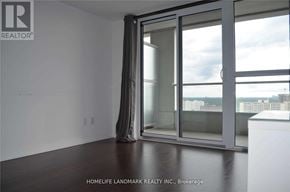 Toronto (Henry Farm) condo for rent - A room with a large window and a sliding glass door.