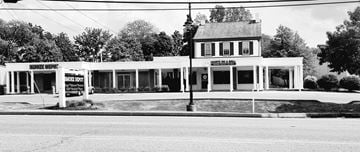 Exton apartment for rent - A black and white photo of a building with a sign that says "Bank of America".