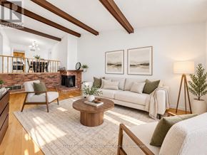 Toronto (Steeles) apartment for rent - A living room with a fireplace and a couch.