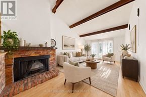 Toronto (Steeles) apartment for rent - A living room with a fireplace and a couch.