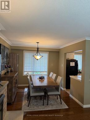 Oakville (Wo West) apartment for rent - A dining room with a table set for six.