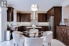 Brampton (Northwest Brampton) apartment for rent - A modern kitchen with dark wood cabinets and a glass table with four chairs.