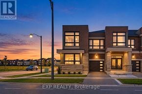 Richmond Hill townhouse for rent - A modern house with a car parked in front and a street lamp on the left.