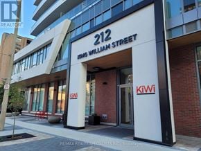 Hamilton (Beasley) condo for rent - The entrance to a building with the number 212 on it.