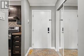 Russell condo for rent - A white door with a black handle is in the center of the image.