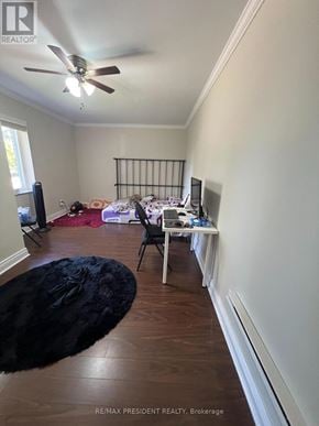 Caledon (Bolton North) apartment for rent - A room with a ceiling fan and a bed with a red blanket.