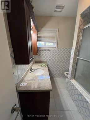 Caledon (Bolton North) apartment for rent - A bathroom with a sink and a toilet.