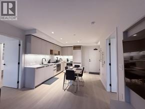 Port Moody apartment for rent - A modern kitchen with a dining table and chairs.