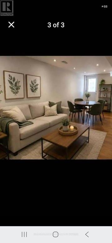 Mississauga (Meadowvale Village) apartment for rent - A living room with a white sofa and a coffee table.