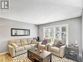 London South (South Y) apartment for rent - A living room with a couch, chair, and coffee table.