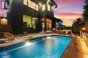 Niagara-On-The-Lake (St. Davids) apartment for rent - A modern house with a pool in the backyard.