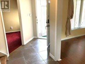 Newmarket (Gorham-College Manor) apartment for rent - A room with a doorway leading to another room.