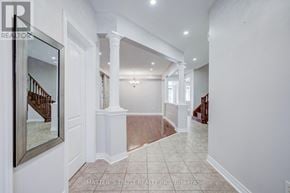 Aurora apartment for rent - A spacious room with white walls and a wooden floor.