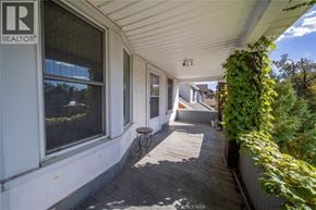 Windsor apartment for rent - A balcony with a table and chairs is seen in the image.