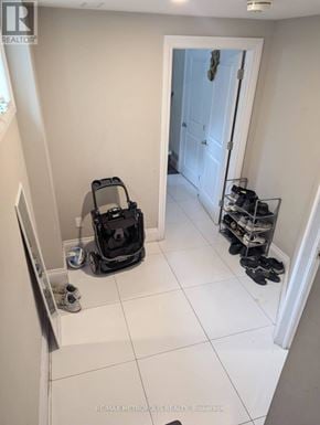 Toronto (Dorset Park) apartment for rent - A room with a vacuum cleaner and shoes.