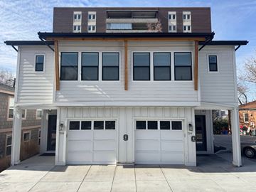 Salt Lake City apartment for rent - A two-story house with a white garage door.