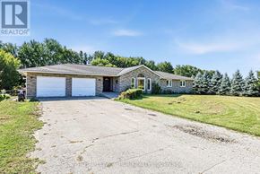 Essa apartment for rent - A two-car garage is attached to a house.