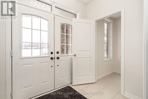 Shelburne apartment for rent - A white door with a glass window is on the left and a white door with a window on the right.