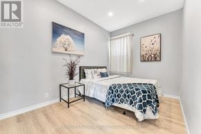 Hamilton (Landsdale) apartment for rent - A bedroom with a bed, a nightstand, and two pictures on the wall.