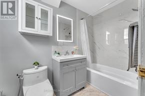 Hamilton (Landsdale) apartment for rent - A white bathroom with a toilet, sink, and bathtub.