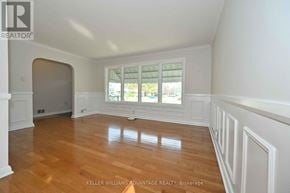 Oshawa (Centennial) apartment for rent - A kitchen with wooden cabinets and a stainless steel dishwasher.