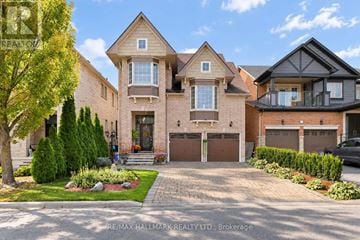 Richmond Hill (Jefferson) apartment for rent - A large, well-maintained house with a driveway and landscaping in front.