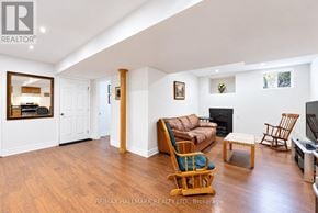Richmond Hill (Jefferson) apartment for rent - A living room with a wooden floor and furniture.