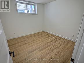 Clarence-Rockland apartment for rent - A room with wooden flooring and a window.