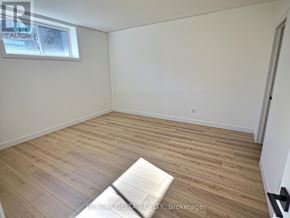 Clarence-Rockland apartment for rent - A room with wooden flooring and a window.