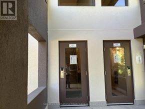 Blue Mountains townhouse for rent - Two doors with signs on them in a hallway.