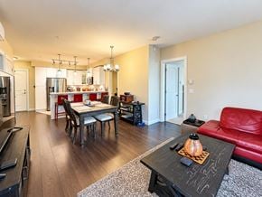 Surrey apartment for rent - A modern kitchen with a dining table and chairs.