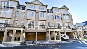 Oshawa (Windfields) townhouse for rent - A building with the words "REALTOR" on the side of it.