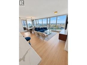 Vancouver apartment for rent - A living room with a view of the city.