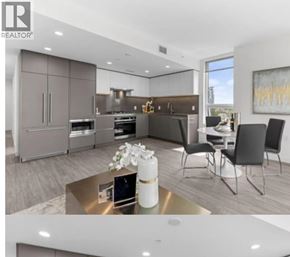 Burnaby apartment for rent - A modern kitchen with a dining area and a large window.