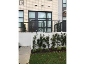 Vancouver apartment for rent - A building with a sign that says REALTOR on it.