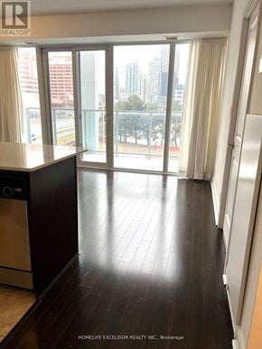 Mississauga (City Centre) condo for rent - A kitchen with a dishwasher and a refrigerator.
