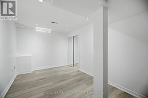 Brampton (Brampton West) townhouse for rent - A white room with a door and a window.