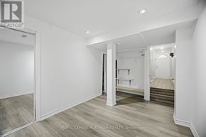 Brampton (Brampton West) townhouse for rent - A white bedroom with a bed and a wardrobe.