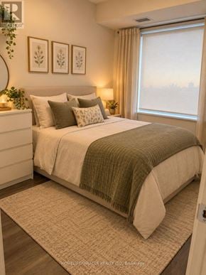 Vaughan (Concord) condo for rent - A bedroom with a large bed and a window with curtains.