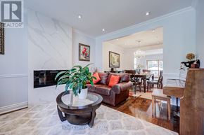 Toronto (Leaside) apartment for rent - A living room with a fireplace and a coffee table.