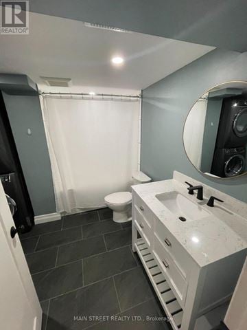 Georgina (Sutton & Jackson's Point) apartment for rent - A bathroom with a toilet, sink, and mirror.