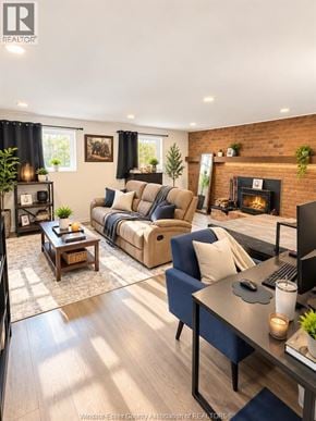 Tecumseh apartment for rent - A living room with a fireplace and a couch.