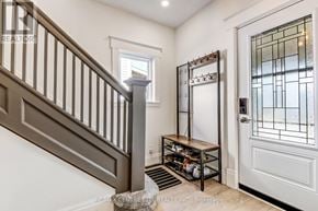 St. Thomas apartment for rent - A foyer with a staircase and a glass door.