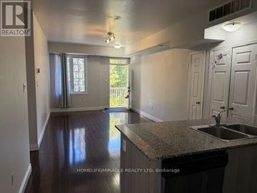 Brampton (Westgate) townhouse for rent - A kitchen with a sink and a window.
